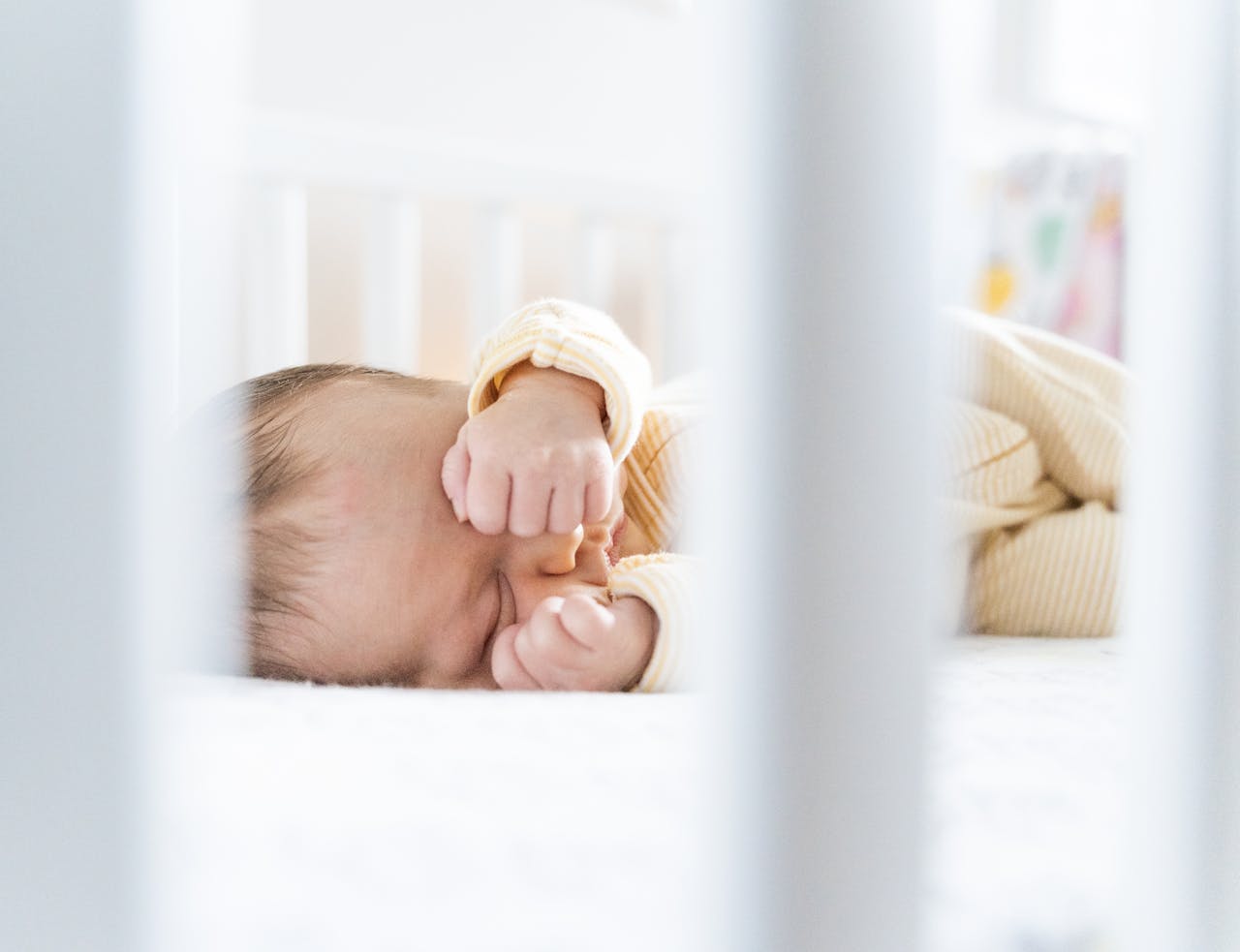Baby sleeping peacefully in a calm nursery environment